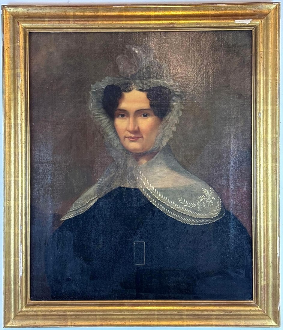 19TH CENTURY OIL PORTRAIT OF A LADY IN EMBROIDERED LACE BONNET: Antique oil on canvas depicting woman in a dark dress with a sheer ruffled headpiece and ornate lace collar. Approximate Dimensions: 30" x 35" Artist or Maker: Unknown Provenance: From a Ne