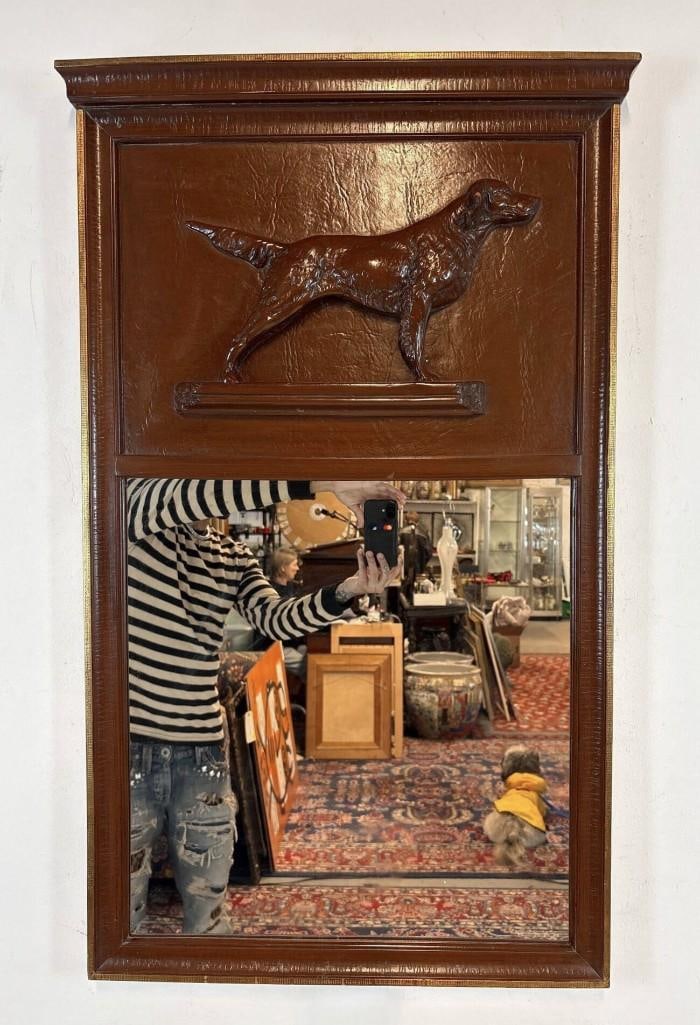 VINTAGE WOOD WALL MIRROR WITH SETTER DOG RELIEF PANEL: A rectangular wall mirror with a hand-carved setter dog relief wooden accent panel at the top. Approximate Dimensions: 38"L x 22"W Maker: Art Dreams & Eclectic Art Designs Provenance: From a New York 