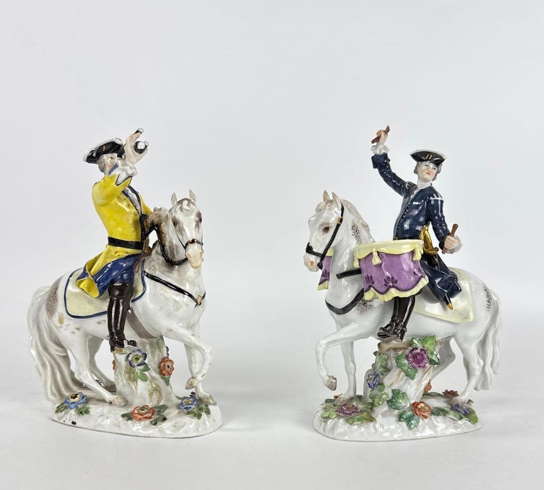 PAIR OF MEISSEN GERMANY PORCELAIN MILITARY FIGURES ON HORSEBACK: Two hand painted 18th-century style Prussian cavalry musicians on horseback; "Saxon Soldier On Horse With Trumpet" and a Kettledrummer on Horseback. NOTE: Losses to both Approximate Dimension