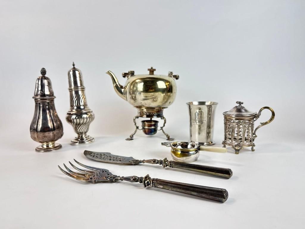 CHRISTOFLE, TIFFANY & CO, ENGLISH SILVER PLATE DISCOVERY LOT: Selection of assorted vintage metalware including Christofle tea kettle on stand, Tiffany & Co. pewter beaker, English silver plate sugar caster, and cased fish serving set. Approximate Dimension