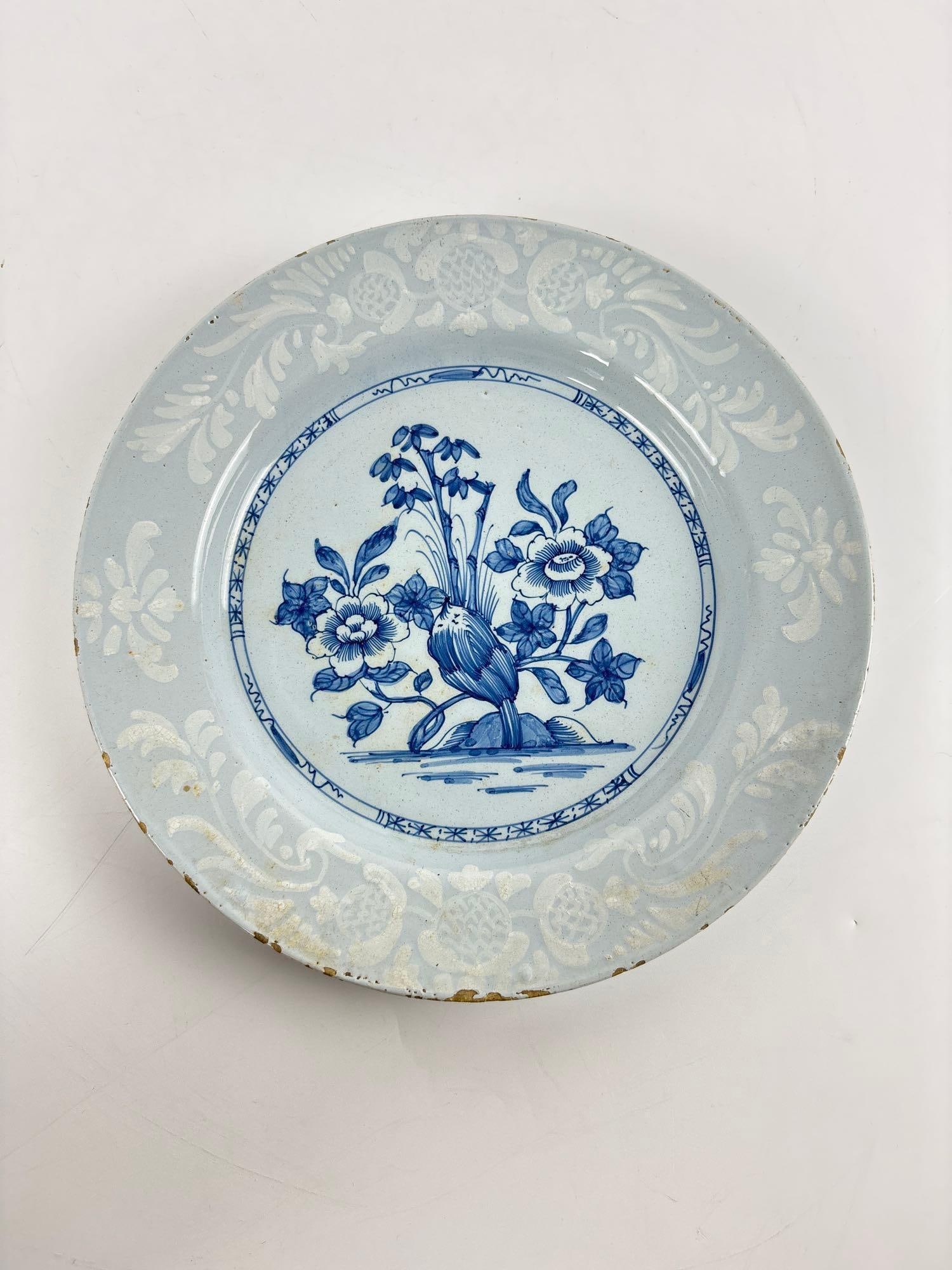 RARE CA. 1760 FAIENCE PLATE WITH SUPER BIANCA DECORATIONS: *Nine inch blue tin-glazed earthenware dish with bamboo and peony blossoms within a geometric and floral border Approximate Dimensions: 8.75" dia Artist or Maker: Unknown