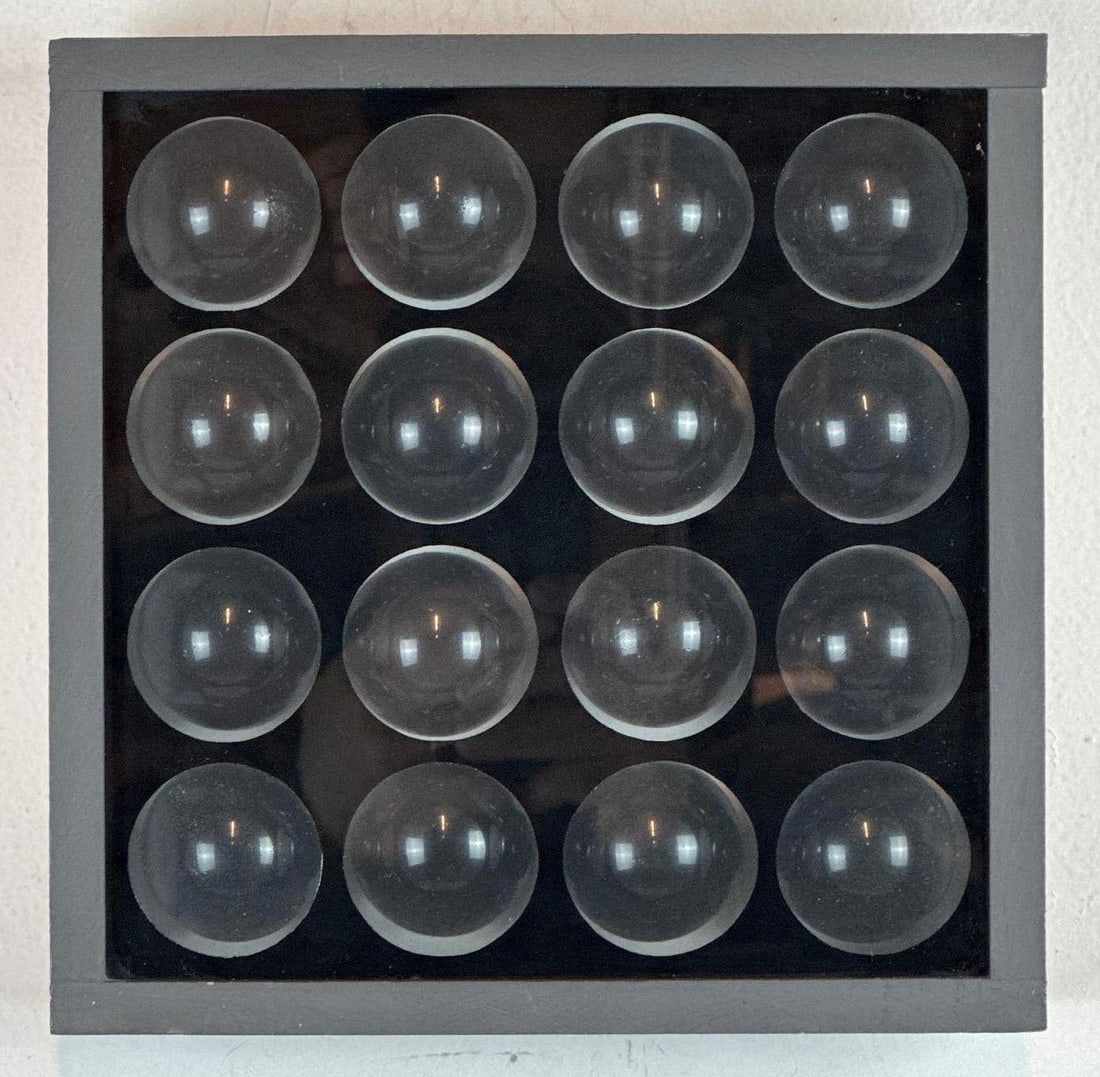 JOHN WILLENBECHER SIGNED UNTITLED BOX CONSTRUCTION 1964: Minimalist grid assemblage of sixteen glass or acrylic spheres within a deep black vitrine frame Approximate Dimensions: 9.5" X 9.5" X 2.5" Artist or Maker: John Willenbecher Pro