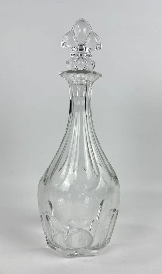 VINTAGE BACCARAT FRANCE FOR COURVOISIER CRYSTAL COGNAC DECANTER AND STOPPER: Mid-century French lead crystal spirits vessel featuring a tapered mallet-form body with wide flat-cut facets, slender neck, and a matching faceted crystal stopper with an integrated glass peg. Approx