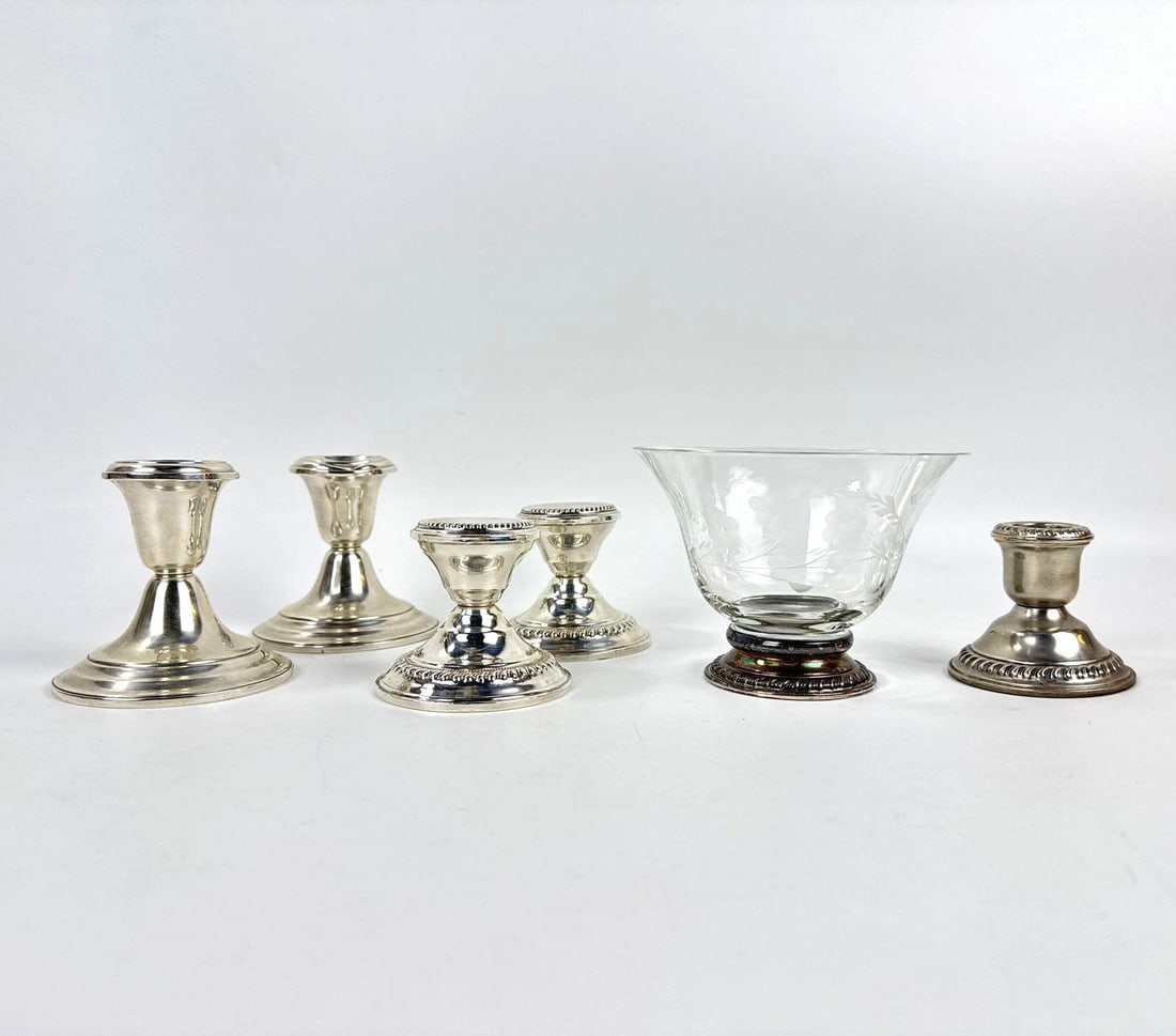 STERLING SILVER WEIGHTED CANDLESTICK AND COMPOTE SERVICE LOT: A mixed collection of mid-century weighted sterling silver tableware. Largest Approximate Dimensions: 3.5”H x 5”Dia Maker(s): Gorham, Katco, N.S Co., Unknown Provenance: From a New York
