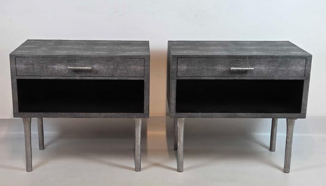 PAIR OF CONTEMPORARY SHAGREEN FINISH NIGHTSTANDS IN MID-CENTURY MODERN STYLE: A matched pair of nightstands or end tables, The pieces feature a textured grey faux-shagreen (stingray skin) finish, a single storage drawer with a sleek linear metal pull, and an open lower cubby, a