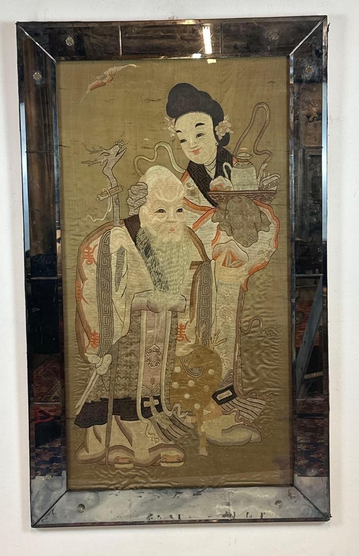 LARGE CHINESE SILK EMBROIDERY PANEL OF SHOU LAO & MAGU: A framed Chinese silk embroidery panel (K'ossu or silk thread embroidery) depicting the Immortals Shou Lao, God of Longevity, and Magu, Goddess of Vitality. The scene features traditional symbols