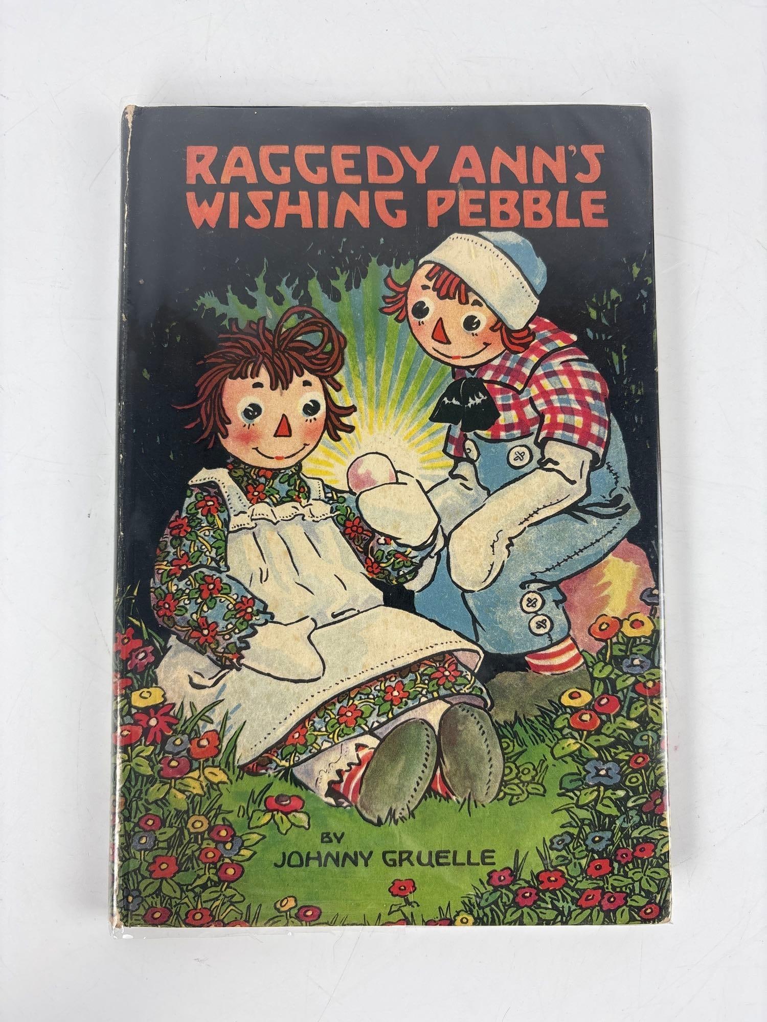 VINTAGE HARDCOVER: "RAGGEDY ANN'S WISHING PEBBLE" (1925) BY JOHNNY GRUELLE: *A highly collectible first edition copy of "Raggedy Ann's Wishing Pebble," part of the esteemed P.F. Volland "Happy Children Books" series, written and illustrated by Johnny Gruel