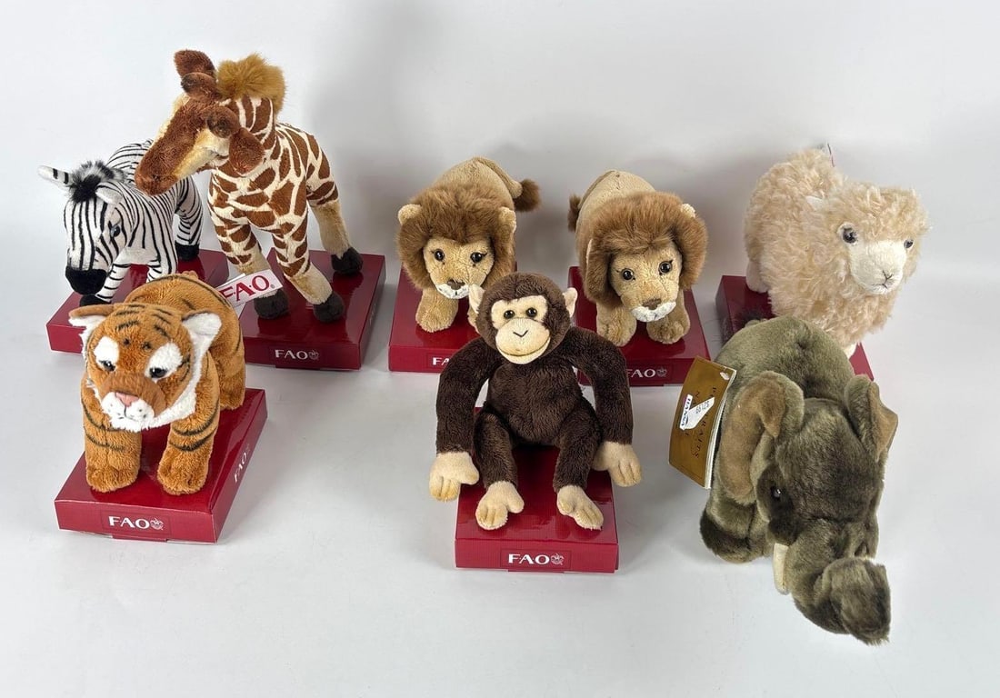 VINTAGE FAO SCHWARZ PLUSH ANIMAL DISCOVERY LOT: *Collection of premium FAO Schwarz stuffed animals including various species with original branded tags and ribbons. Approximate Dimensions: Largest: 11" x 5" x 4" Artist or Maker: Unkno