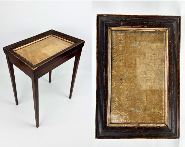 ANTIQUE NEEDLEWORK SAMPLER TOP SHERATON STYLE TEA TABLE: Small-scale mahogany side table with inset 19th-century needlework panel under glass. Approximate Dimensions: 19.5”h x 15” w x 10”d Artist or Maker: Unknown Provenan