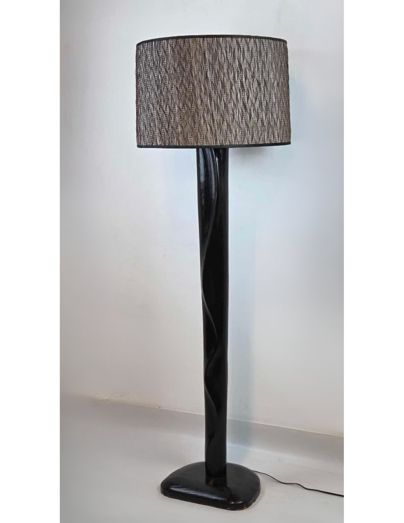 HEIFETZ BLACKENED OAK MODERNIST FLOOR LAMP BY YASHA HEIFETZ: Monumental hand-carved ebonized oak pillar lamp with textured drum shade Approximate Dimensions: 84” Tall Artist or Maker: Unknown Provenance: From a New York Collector