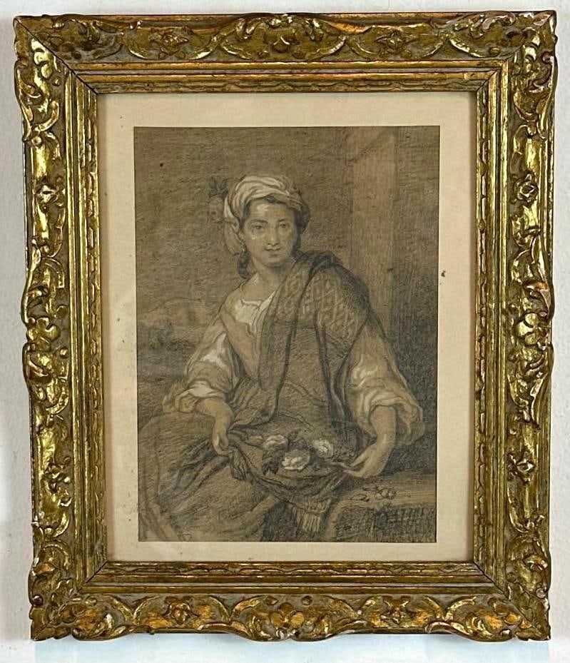 VINTAGE FRAMED FIGURATIVE GRAPHITE DRAWING OF A WOMAN: Graphite drawing on paper of a woman. Set in a gilt wood frame with a mat. Approximate Dimensions: 10”x7”; Frame 15” x 13” Artist or Maker: Unknown Provenance: From a New