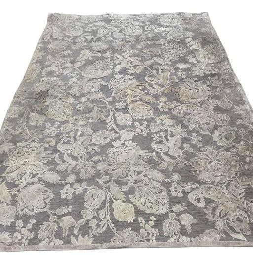 FEIZY SAPHIR ZAM GREY AND PEWTER FLORAL MOTIF RUG: A high-quality 7'6" x 10'6" area rug from the Feizy Saphir collection, featuring a sophisticated "Zam" pattern. Approximate Dimensions: 7'6" x 10'6" Artist or M