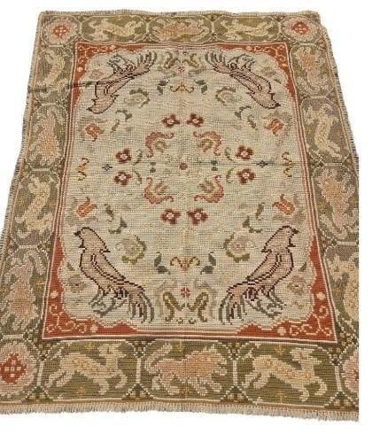 HAND WOVEN ANIMAL MOTIF WOOL RUG: A c hand-woven wool rug featuring a unique pictorial "hunting" or "nature" theme. Approximate Dimensions: 6'-3" x 5' Artist or Maker: Unknown Provena