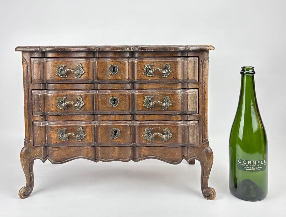 MELDAN FURNITURE FRENCH COUNTRY MINIATURE JEWELRY WHAT-NOT CHEST: *Vintage three-drawer apprentice size commode jewelry box. Approximate Dimensions: 12”h x 17.5”w x 9.75”d Artist or Maker: Meldan Provenance: From a New York Collect