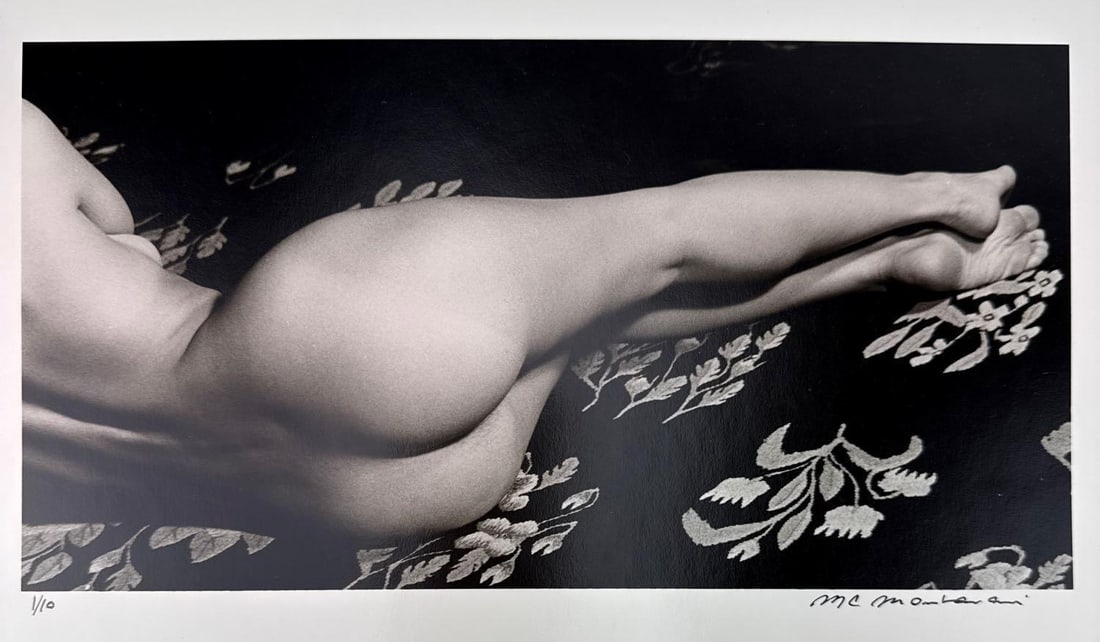 MARIE-CLAIRE MONTANARI SIGNED LIMITED EDITION SILVER GELATIN NUDE PHOTOGRAPH: *Black and white silver gelatin print numbered 1/10 in pencil depicting a reclining female nude against a floral patterned textile backdrop with artist signature in lower right margin. Approximate Dim