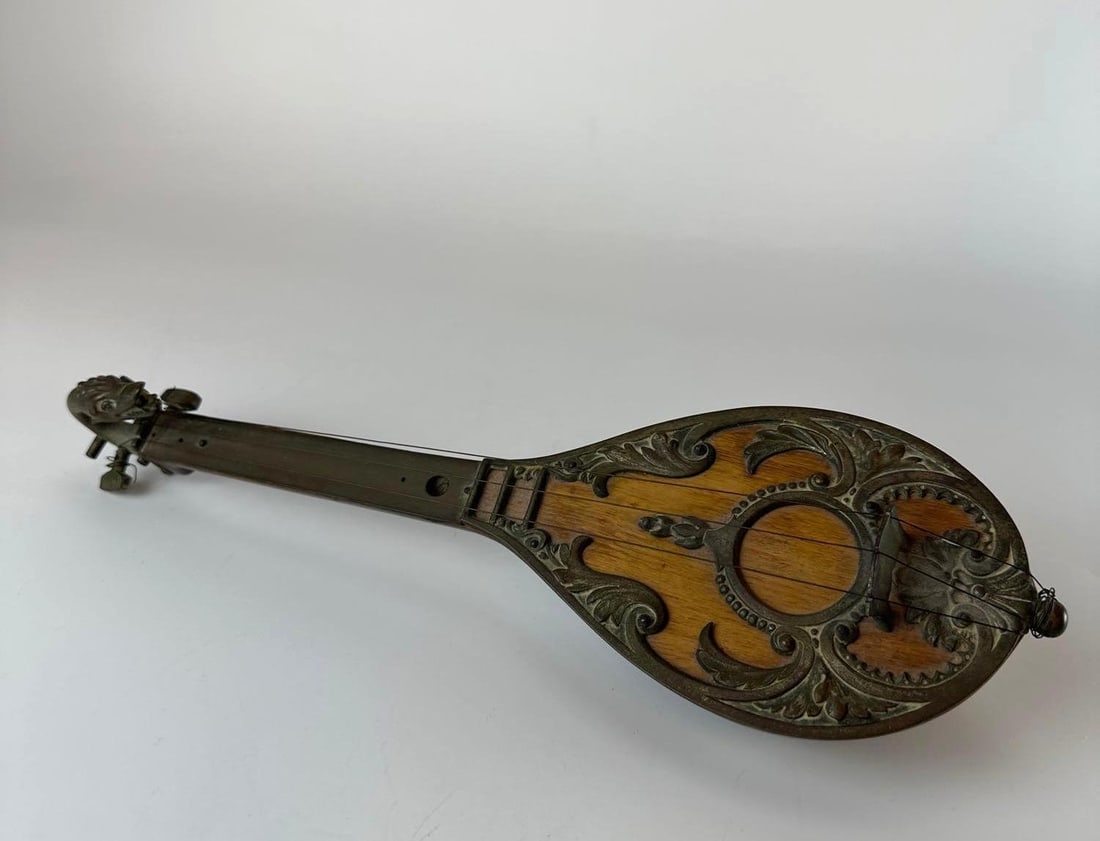 ANTIQUE DECORATIVE MINIATURE LUTE WITH DRAGON FIGUREHEAD: *A late 19th or early 20th-century decorative miniature musical instrument, modeled after a lute or mandolin. Approximate Dimensions: 13.5"L x 4"W x 3.25"D Artist or Maker: Unknown<