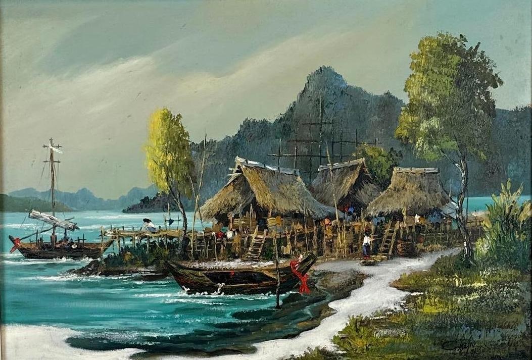 LARGE SIGNED INDONESIAN COASTAL VILLAGE PAINTING: *Oil painting on canvas depicting a traditional Indonesian coastal village with thatched-roof huts built on stilts along the water's edge. . In a mid-century style wood frame with a linen-lined in