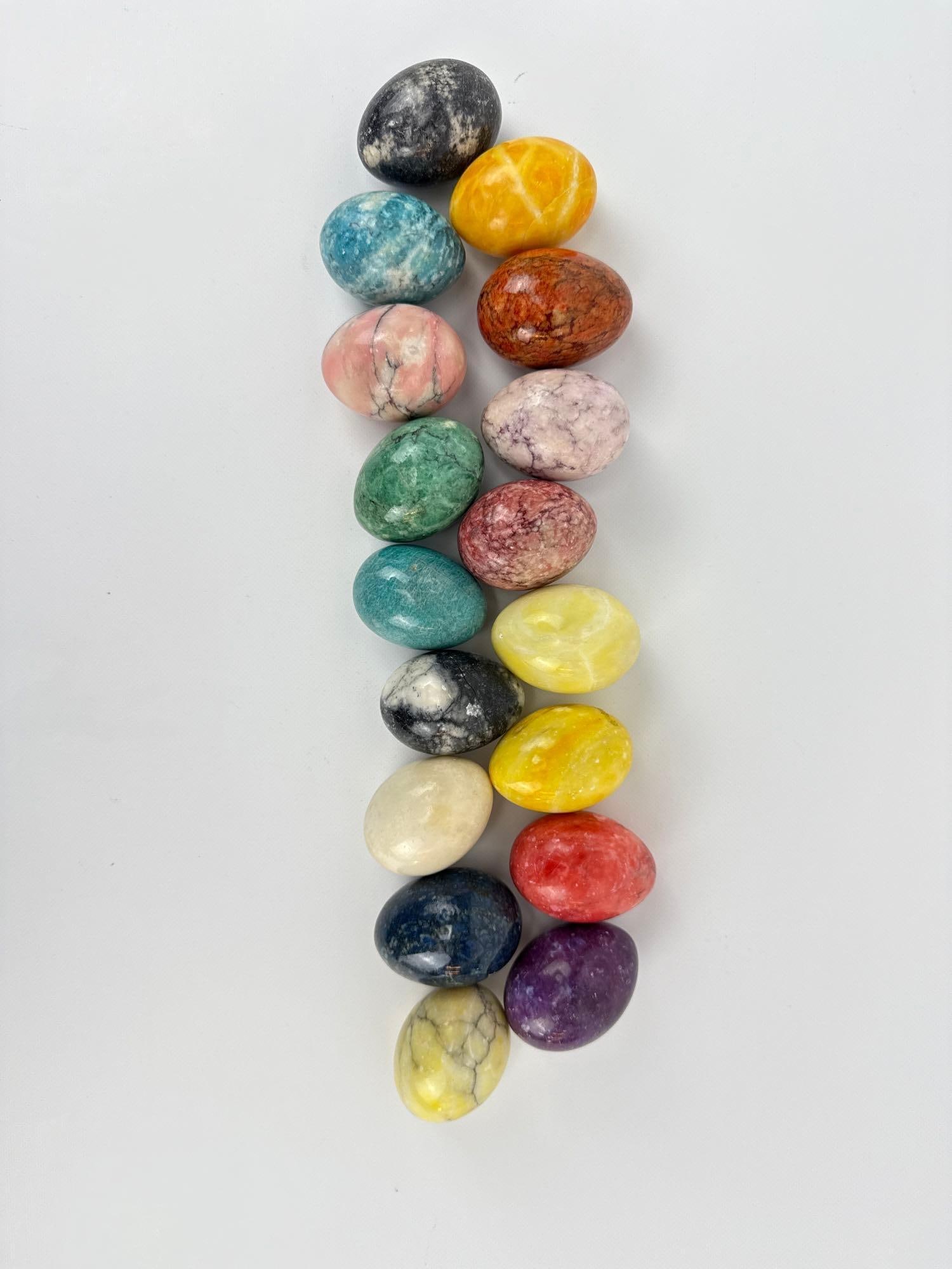 LOT OF 17 VINTAGE HAND CARVED ITALIAN STONE EGGS: Fabulous collection of polished natural stone and marble decorative eggs in various colors and mineral patterns. Approximate Dimensions: 2.5" in length Artist or Maker: Unknown Provenance: From a 