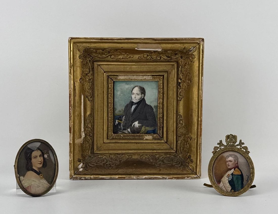 GROUP OF THREE ANTIQUE MINIATURE PORTRAITS - ONE NAPOLEON SIGNED DERVAL: A curated trio of small-scale antiques including a 19th-century gentleman's portrait with dog in a gilt wood frame and two signed oval portraits in gilt metal frames. One Napoleon Portrait signed 
