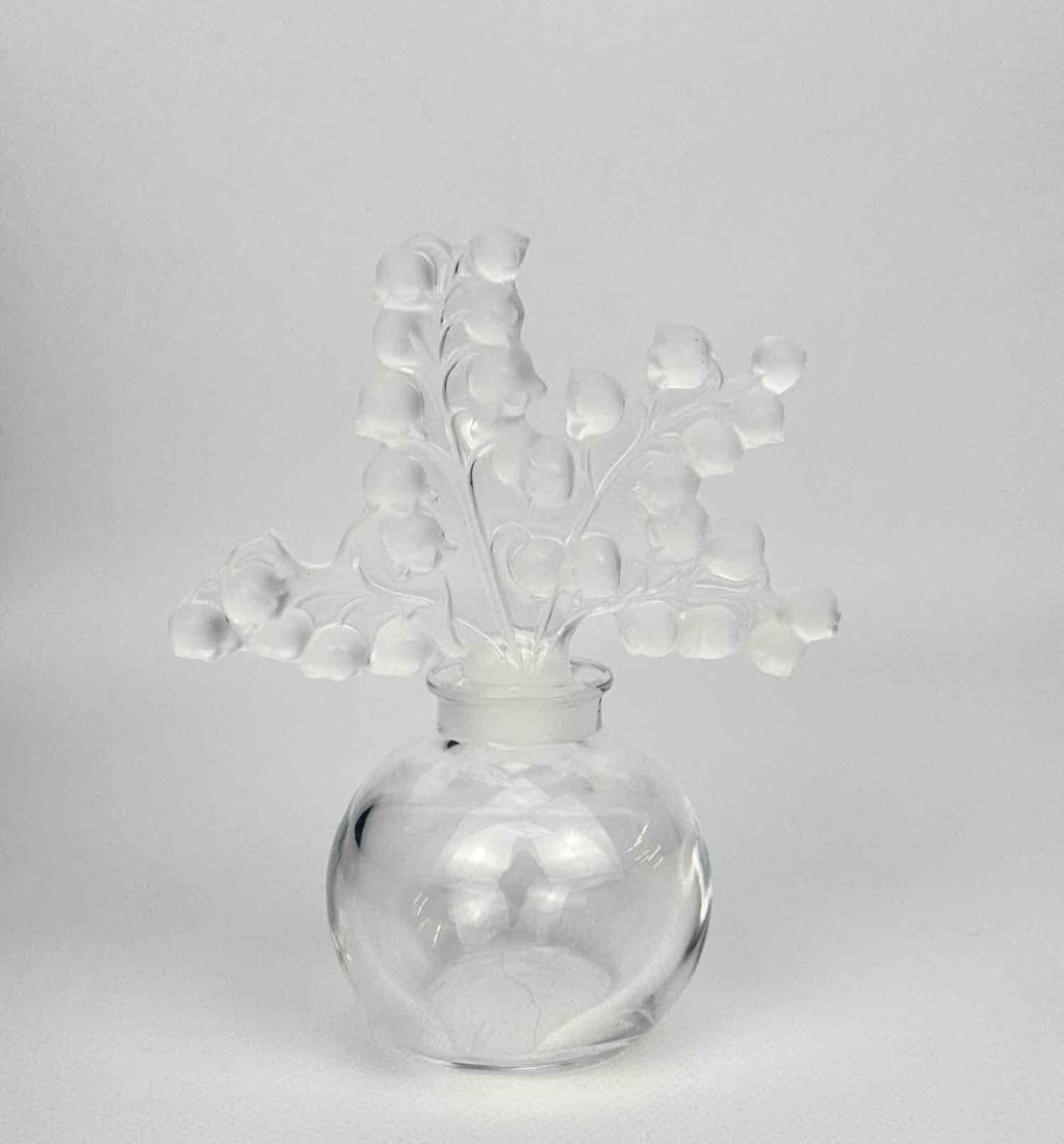 LALIQUE FRANCE "CLAIREFONTAINE" FROSTED CRYSTAL PERFUME BOTTLE SIGNED: An elegant frosted and clear crystal scent bottle featuring the "Clairefontaine" design. Approximate Dimensions: 4.5"h x 3.75"w x 2.25"d Artist or Maker: Lalique Provenance: From a