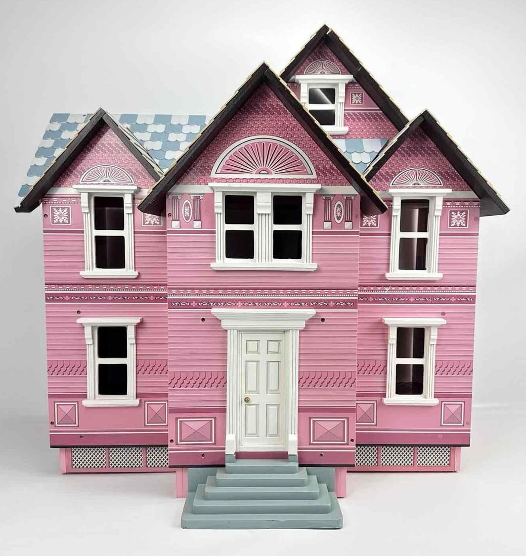 MELISSA & DOUG PINK CLASSIC HEIRLOOM VICTORIAN WOODEN DOLLHOUSE: Hand-painted three-story wooden Victorian dollhouse with 1:12 scale furniture and four-piece family. Approximate Dimensions: 28.5”h x 29.5”w x 17.5”d Artist or Maker: Melissa and Dou