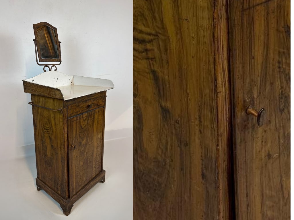 ANTIQUE FAUX BOIS PAINTED SHEERT METAL SURGICAL MEDICAL VANITY CABINET WITH SWIVEL MIRROR: Antique early 20th century industrial medical washstand cabinet constructed from sheet iron finished with highly detailed hand-painted faux bois wood graining beneath a white enameled gallery top and 