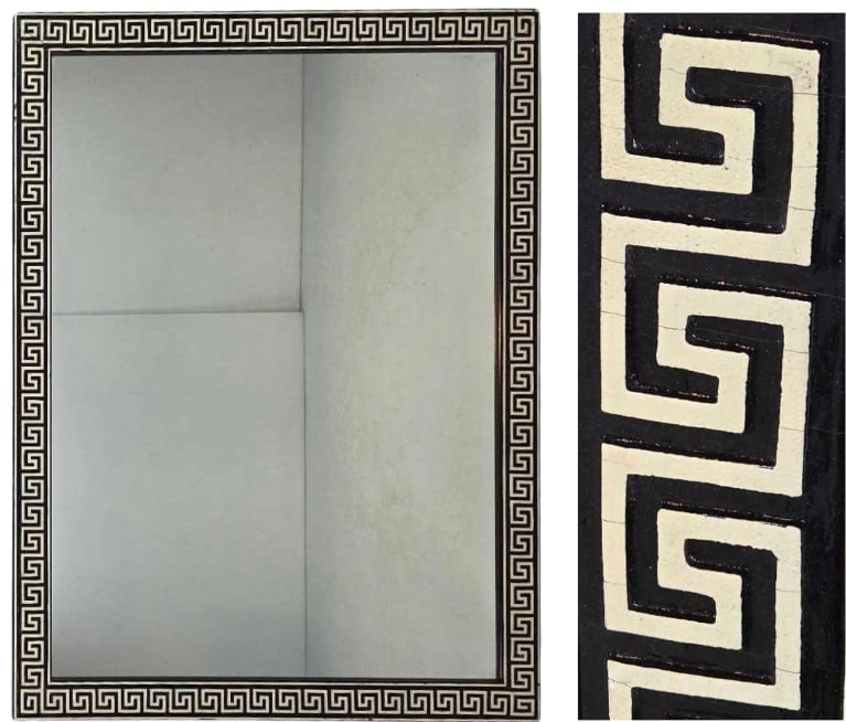 VINTAGE GREEK KEY MOTIF FRAME MIRROR: A vertical hanging, rectangular wall mirror in a black frame with Greek key meander border. Approximate Dimensions: 43"L x 33.25" W Artist or Maker: Unknown Provenance: From a New York Collect