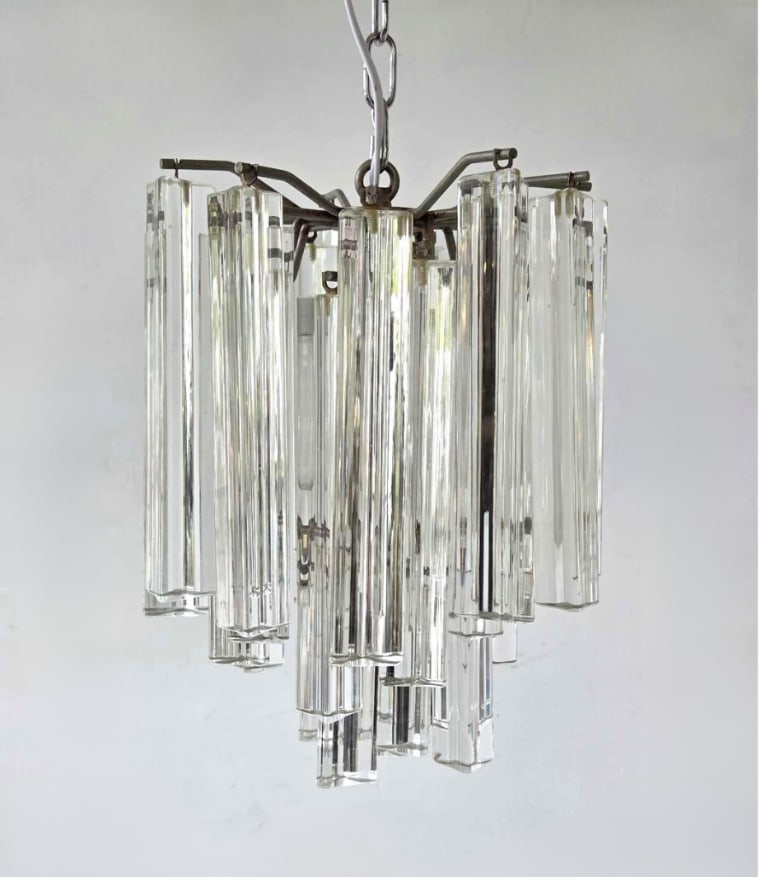 VENINI VINTAGE ITALIAN MID CENTURY MODERN RECTANGULAR TRYALON CRYSTAL CHANDELIER: Vintage mid-century modern tiered pendant chandelier designed by Paolo Venini for Venini, composed of clear glass triedri prismatic crystal rods suspended in staggered rows from a polished chrome-plat