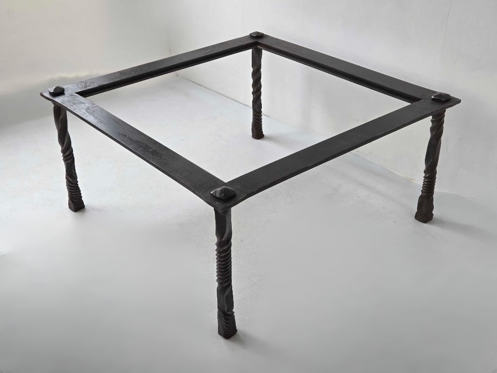 ROBERT FERRARONI (AMERICAN, CONTEMPORARY) HAND-WROUGHT PATINATED STEEL COCKTAIL / COFFEE TABLE FRAME: An exceptional, upscale artisanal coffee table crafted by Brooklyn-based master metal sculptor and high-end furniture designer Robert Ferraroni (founder of Ferra Designs). The piece features a heavy, 