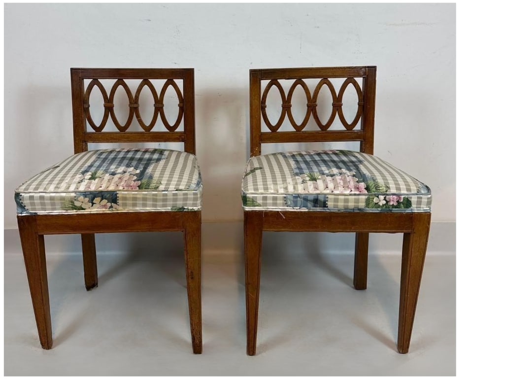 PAIR OF NEOCLASSICAL STYLE FRUITWOOD OPENWORK GEOMETRIC LATTICE BACK SIDE CHAIRS: Pair of Neoclassical style accent chairs. Approximate Dimensions: 18”x16”x29” Artist or Maker: Unknown Provenance: From a New York Collector