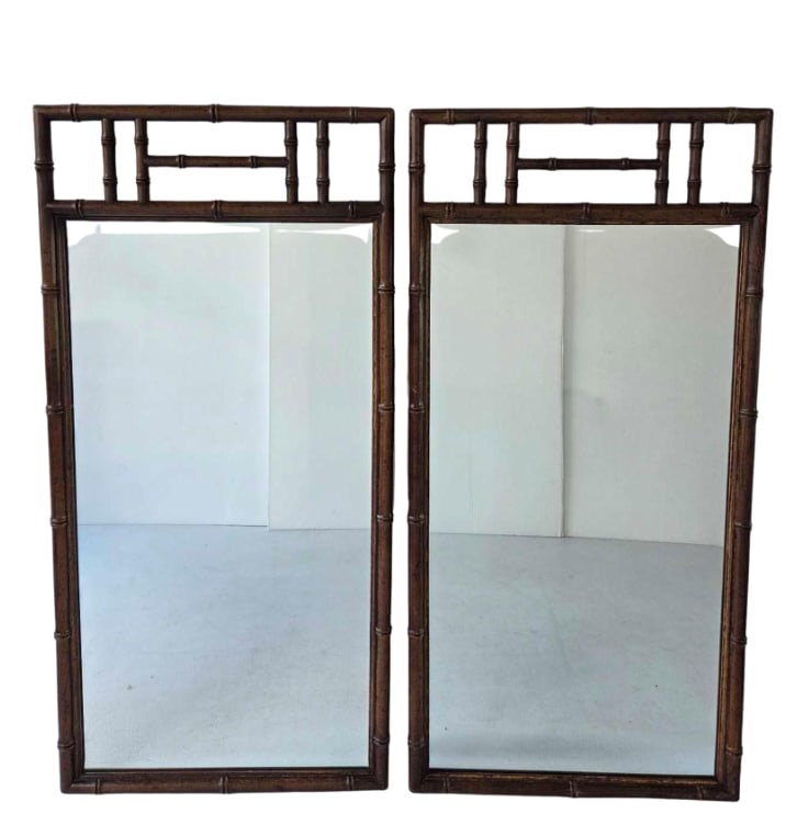 LA BARGE STYLE FAUX BAMBOO RECTANGULAR WALL MIRRORS PAIR: Pair of vintage Hollywood Regency style rectangular accent mirrors in dark stained faux bamboo turned wood frames with Chinese Chippendale open geometric fretwork headers Approximate Dimensions: 46