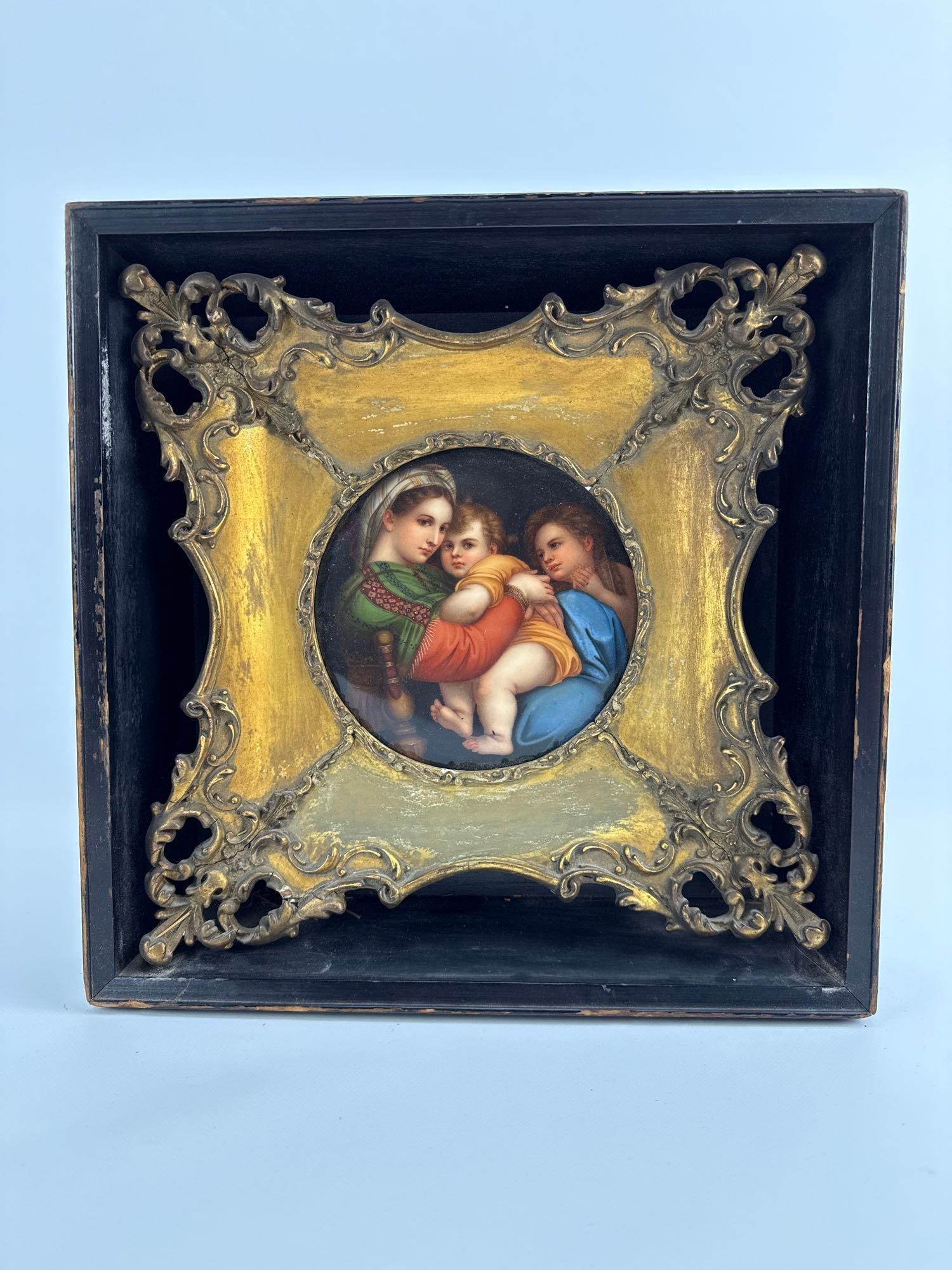 19TH CENTURY KPM STYLE PORCELAIN PLAQUE OF MADONNA DELLA SEGGIOLA: *Hand-painted round porcelain plaque after Raphael depicting the Madonna and Child in a deep wooden ornate shadow box frame. Approximate Dimensions: 11.5” x 11.5”; box 13” x 13&rdquo