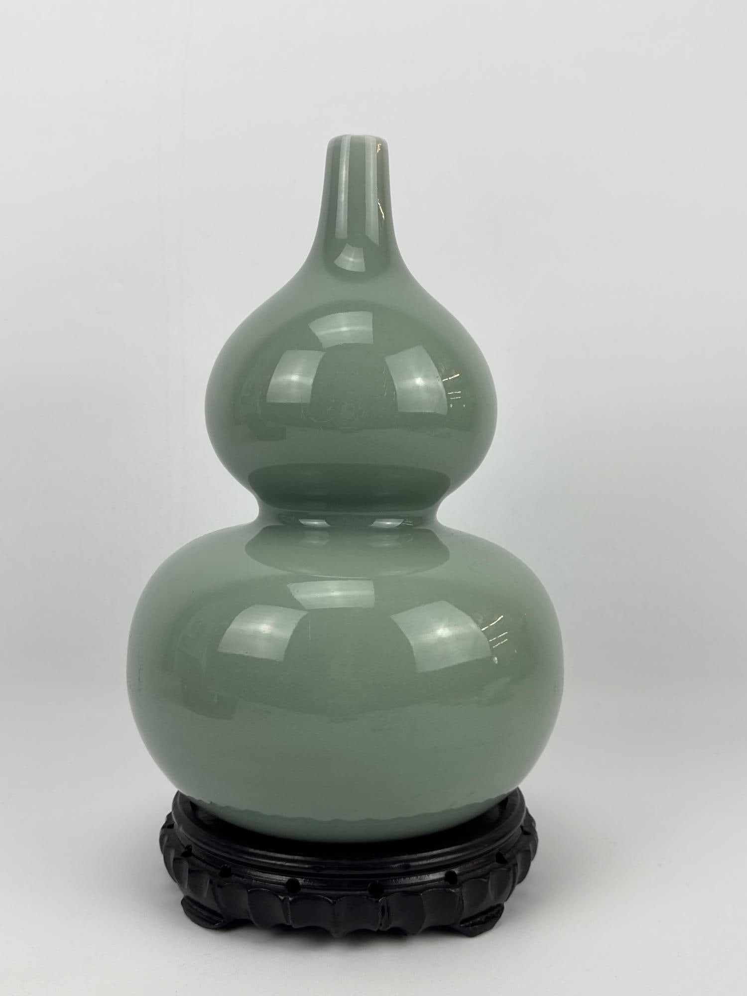 CHINESE CELADON GLAZED DOUBLE GOURD VASE WITH WOOD STAND, QIANLONG MARK (1 of 12)