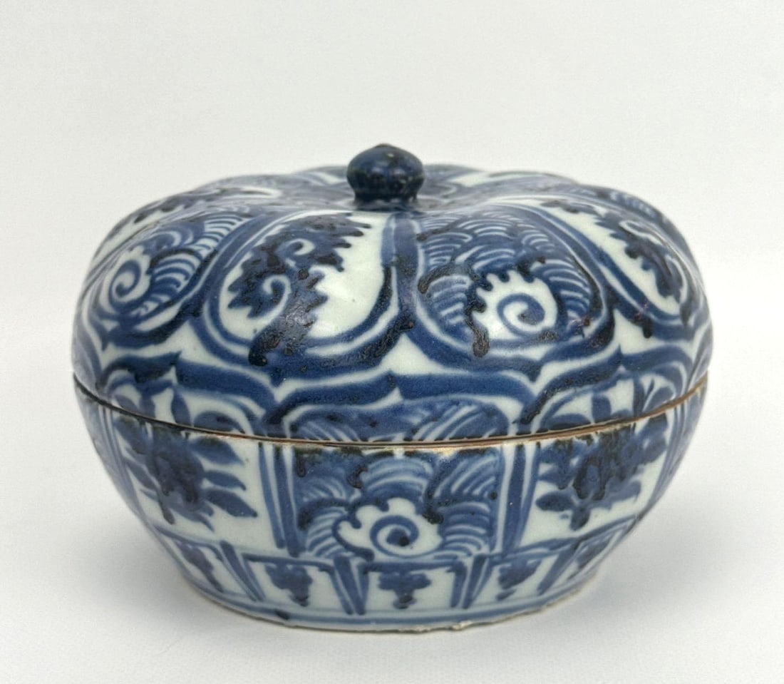 ANTIQUE CHINESE PORCELAIN BLUE AND WHITE COVERED POT, MARKED 15th-16th CENTURY: Circa 15th to 16th century melon-form porcelain vessel with underglaze cobalt scrolling foliate decoration and fitted lid. Approximate Dimensions: 3.75”H x 5”Dia Artist or Maker: Unknown P