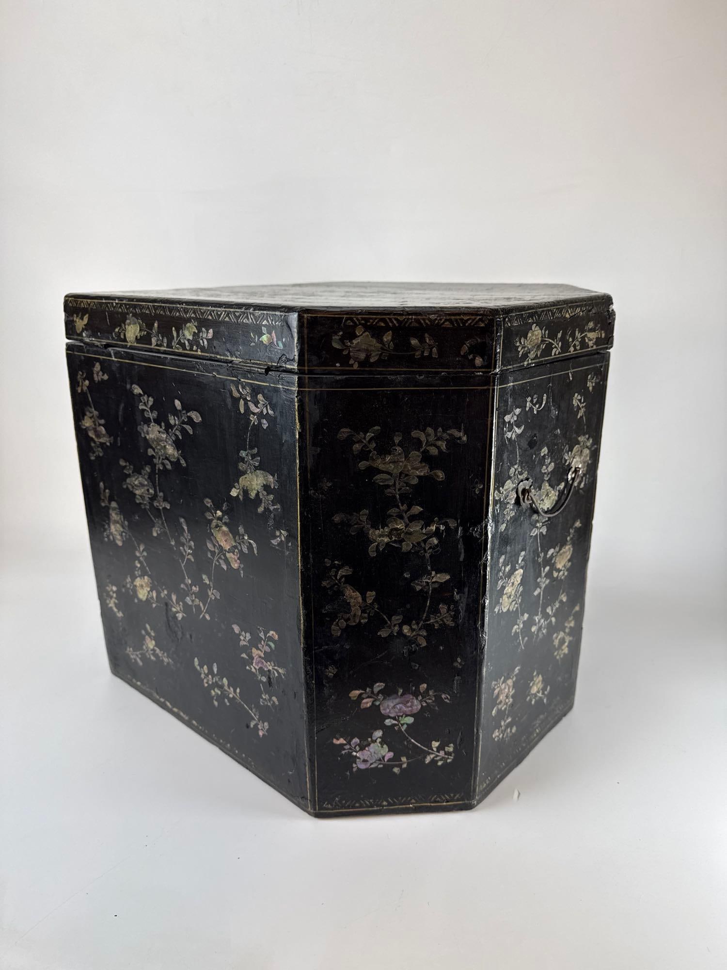 CHINESE ANTIQUE CANTED LAQUE BURGAUTÉ MOTHER OF PEARL INLAY TEA CASKET: *Ornate black lacquer tea box with elaborate iridescent mother of pearl landscape and floral inlays. Approximate Dimensions: 14” x 18” x 14” h Artist or Maker: Unknown