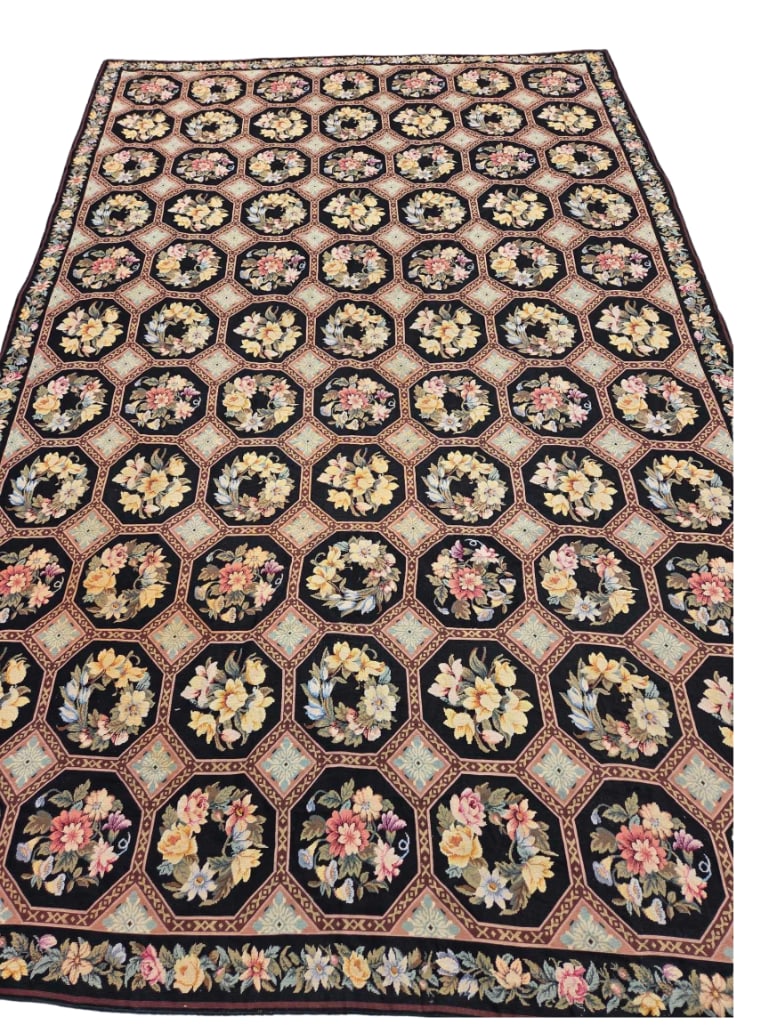 MONUMENTAL VINTAGE FRENCH AUBUSSON STYLE BLACK GROUND NEEDLEPOINT RUG, 16’ X 10’-4: Large room-size wool needlepoint carpet structured with an allover trellis pattern of intersecting geometric octagonal panels, each enclosing individual hand-stitched floral bouquets and botanical wre