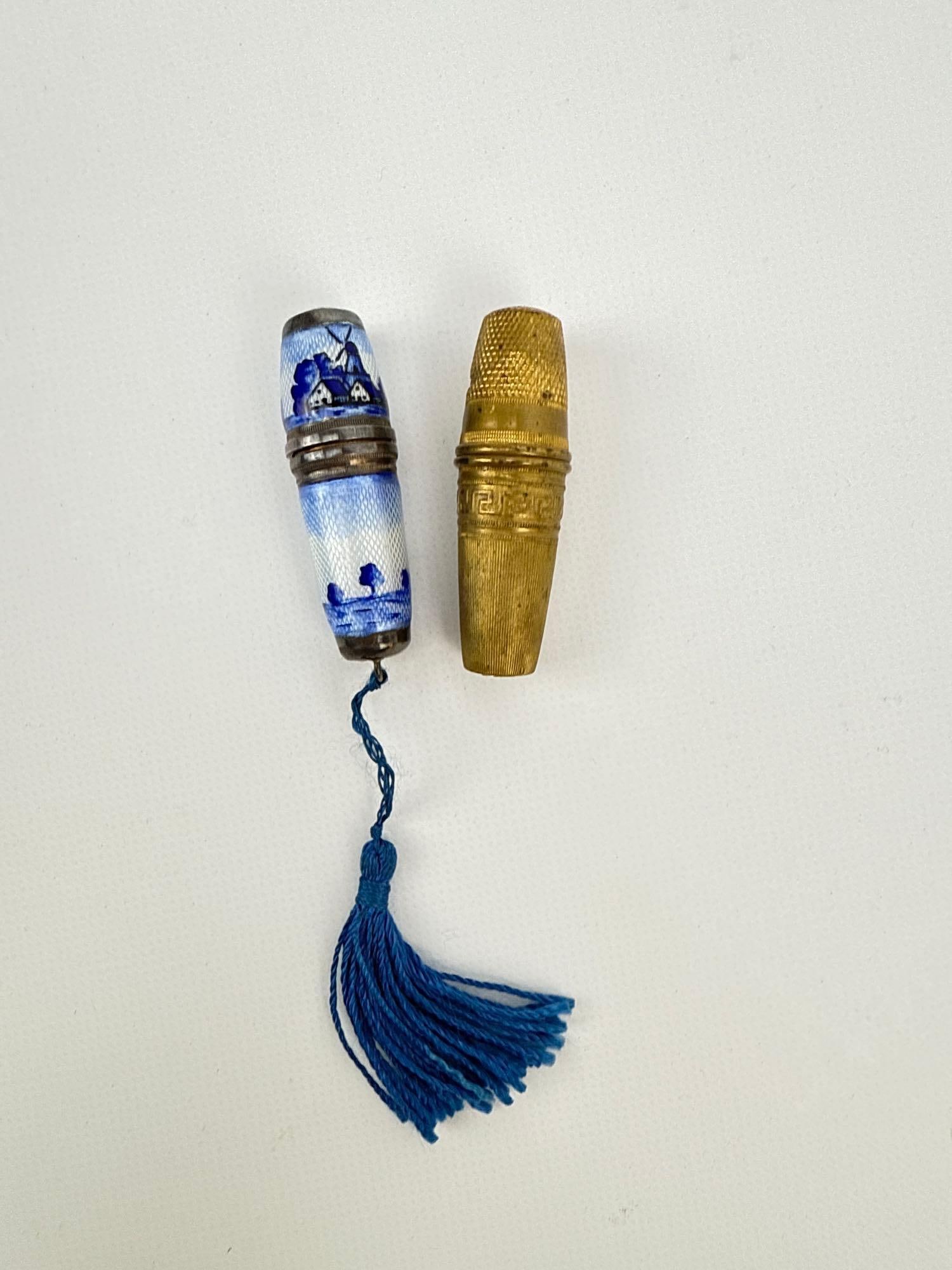 TWO ANTIQUE GERMAN STERLING SILVER & ENAMEL ETUI TRAVEL SEWING KITS: Pair of 19th-century German miniature travel sewing cases. Approximate Dimensions: 2" X .75" Artist or Maker: Unknown Provenance: Fro