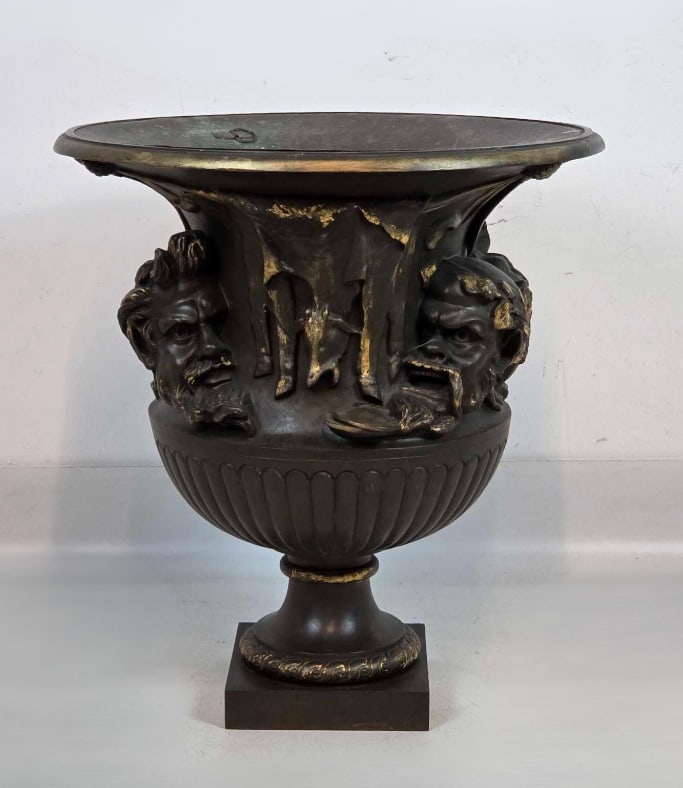 F. BARBEDIENNE FONDEUR FRENCH PATINATED BRONZE URN: Large 19th-century patinated bronze with a classical Bacchic relief frieze and high-relief Silenus masks on a square plinth base. Approximate Dimensions: 22.75"h x 21"dia Artist or Maker: Fer