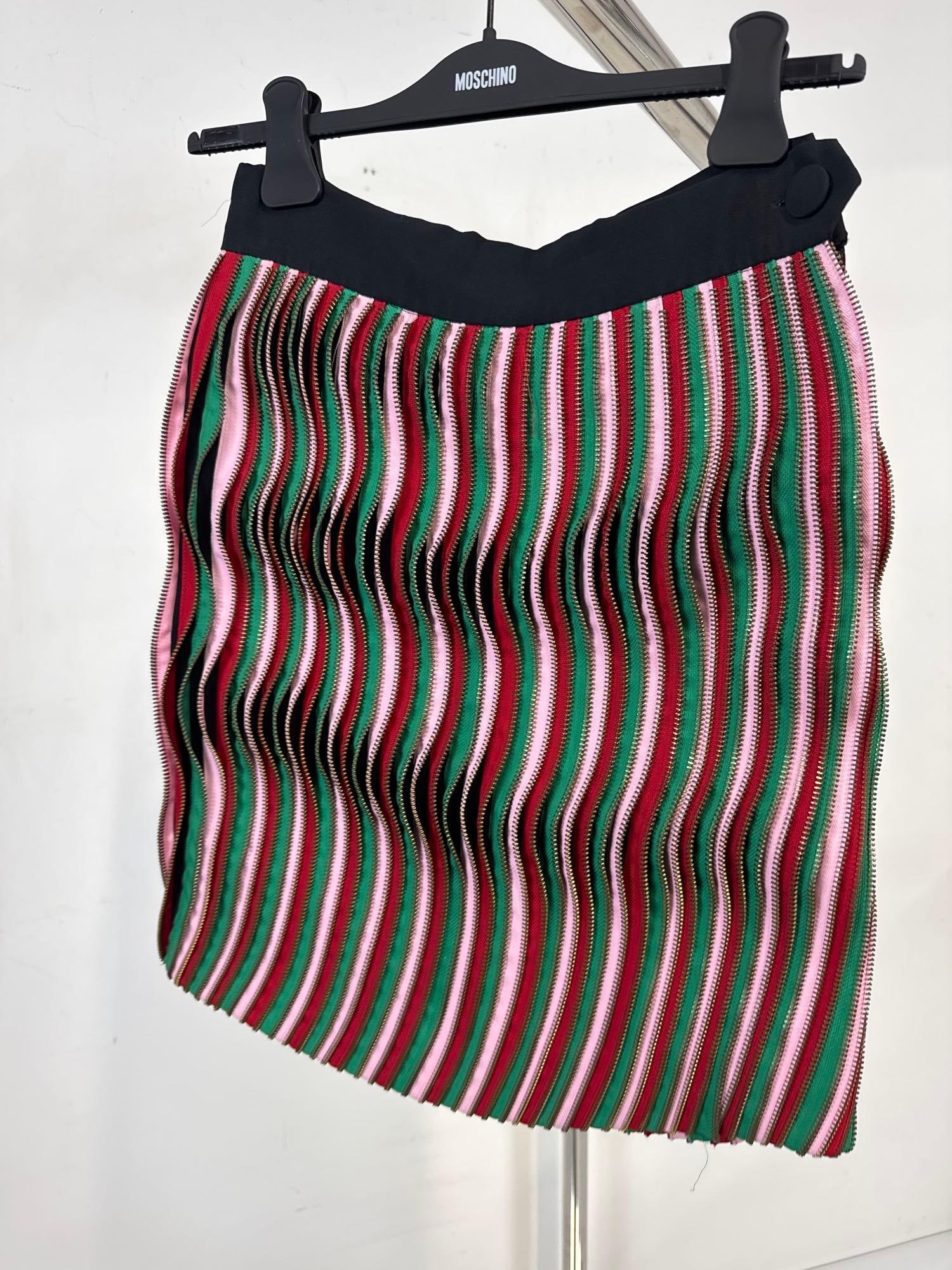 MOSCHINO ARCHIVAL SAMPLE WAVY ZIPPER APPLIQUE SKIRT: A bold, iconic, highly collectible statement piece by Jeremy Scott for MOSCHINO. This item is a follow up to our Italian Fashion HQ Auction originally held in June of 2026. A unique once-in-a-lifetime
