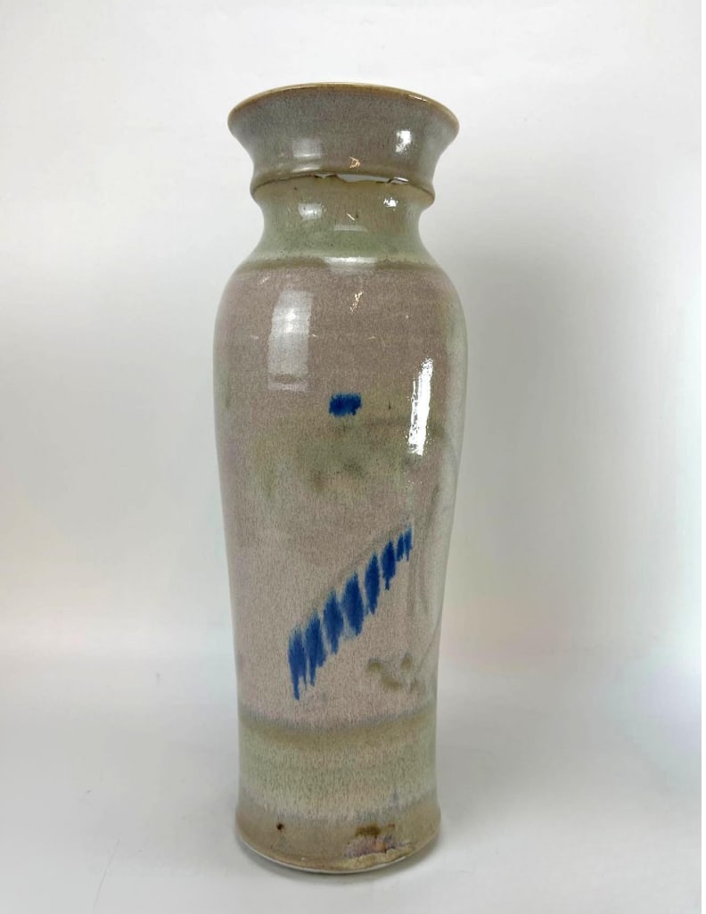 HANDCRAFTED SALT GLAZE STONEWARE VASE: Tall handcrafted salt-glaze grey stoneware art pottery floor vase decorated with a classic hand-painted cobalt blue floral vine design Approximate Dimensions: 6”diameter x 15” tall Artist 