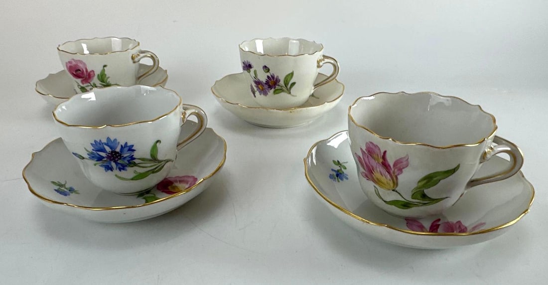 SET OF 4 ANTIQUE MEISSEN HAND-PAINTED FLORAL TEACUPS AND SAUCERS: Set of four antique German Meissen hard-paste porcelain teacups and matching saucers. Approximate Dimensions: 4”diameter Artist or Maker: Unknown Provenance: A New York Collecto
