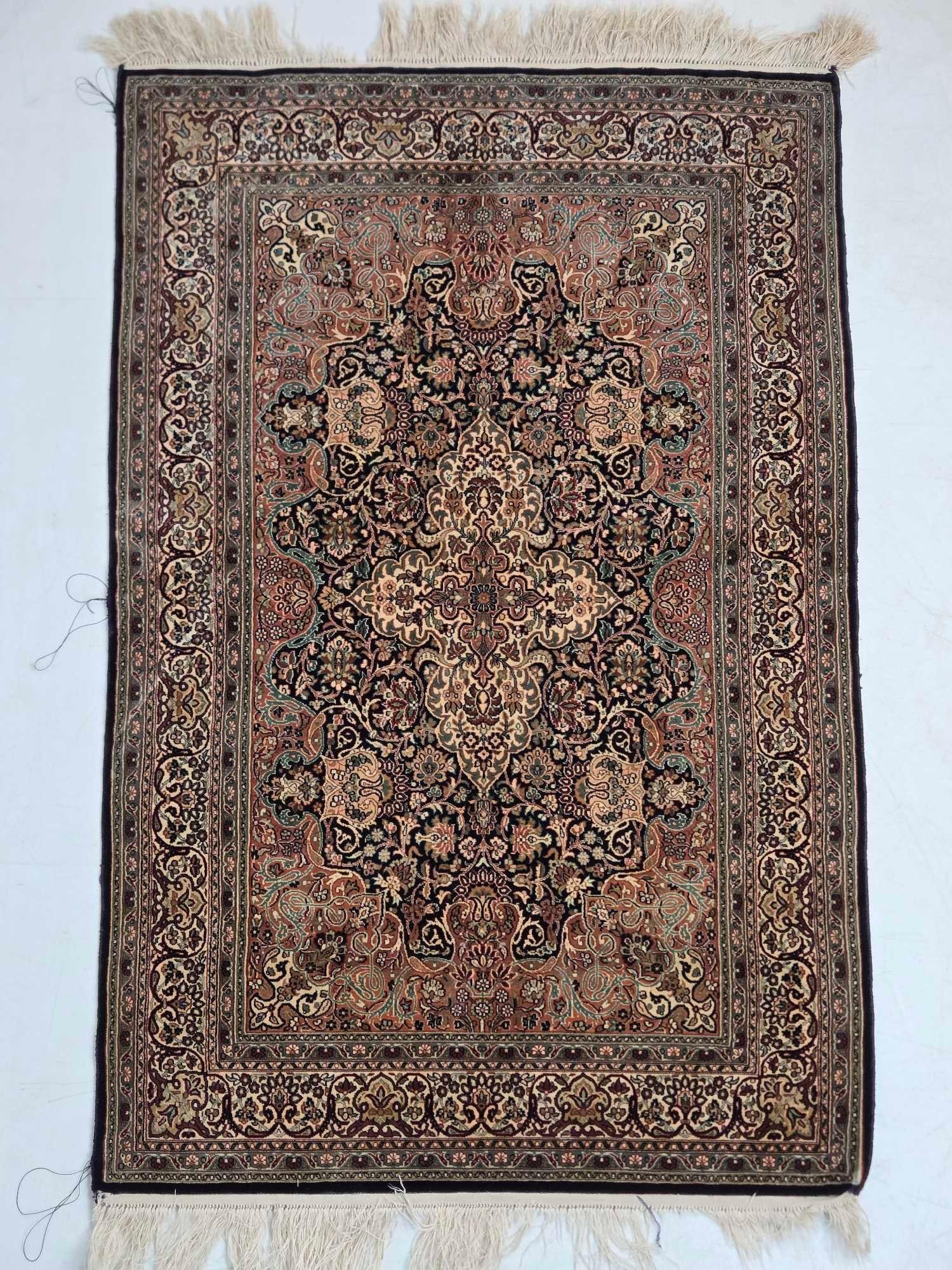 HAND KNOTTED DIMINUTIVE SILK MEDALLION RUG: *Fine hand woven pure silk mat size rug. Approximate Dimensions: 2' x 3'1" Artist or Maker: Unknown Provenance: From a New York Collector <