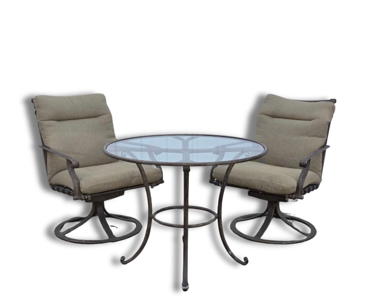 PAIR OF BROWN JORDAN SWIVEL ARM CHAIRS AND CIRCULAR GLASS DINING TABLE: *Three-piece vintage outdoor patio set including two upholstered swivel rocker arm chairs and one coordinating circular glass top table Approximate Dimensions: Chairs: