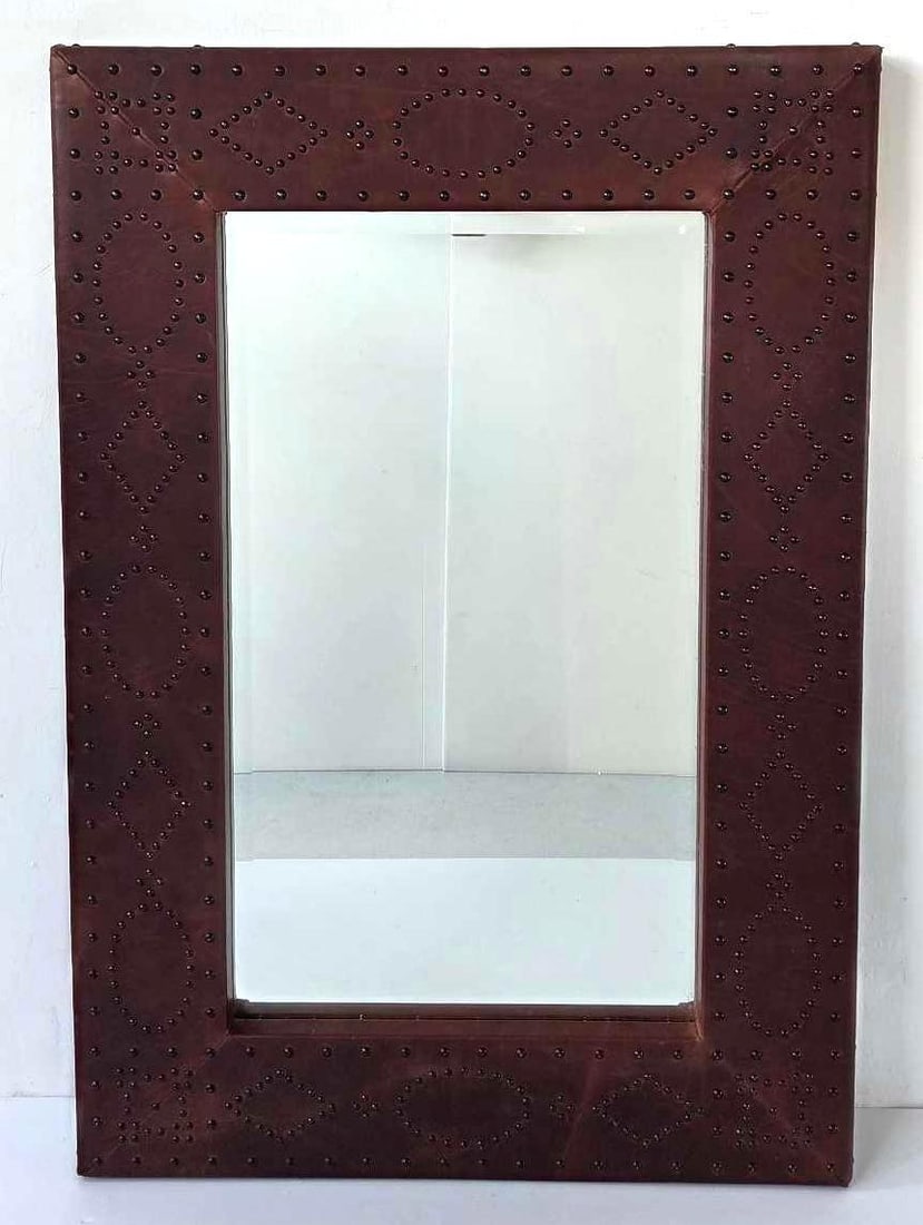 RALPH LAUREN LEATHER WRAPPED LARGE RECTANGULAR MIRROR WITH NAIL HEAD DETAIL: Large hanging plate glass mirror bordered by a broad brown leather-clad frame accented with geometric patterned brass tack studding. Approximate Dimensions: