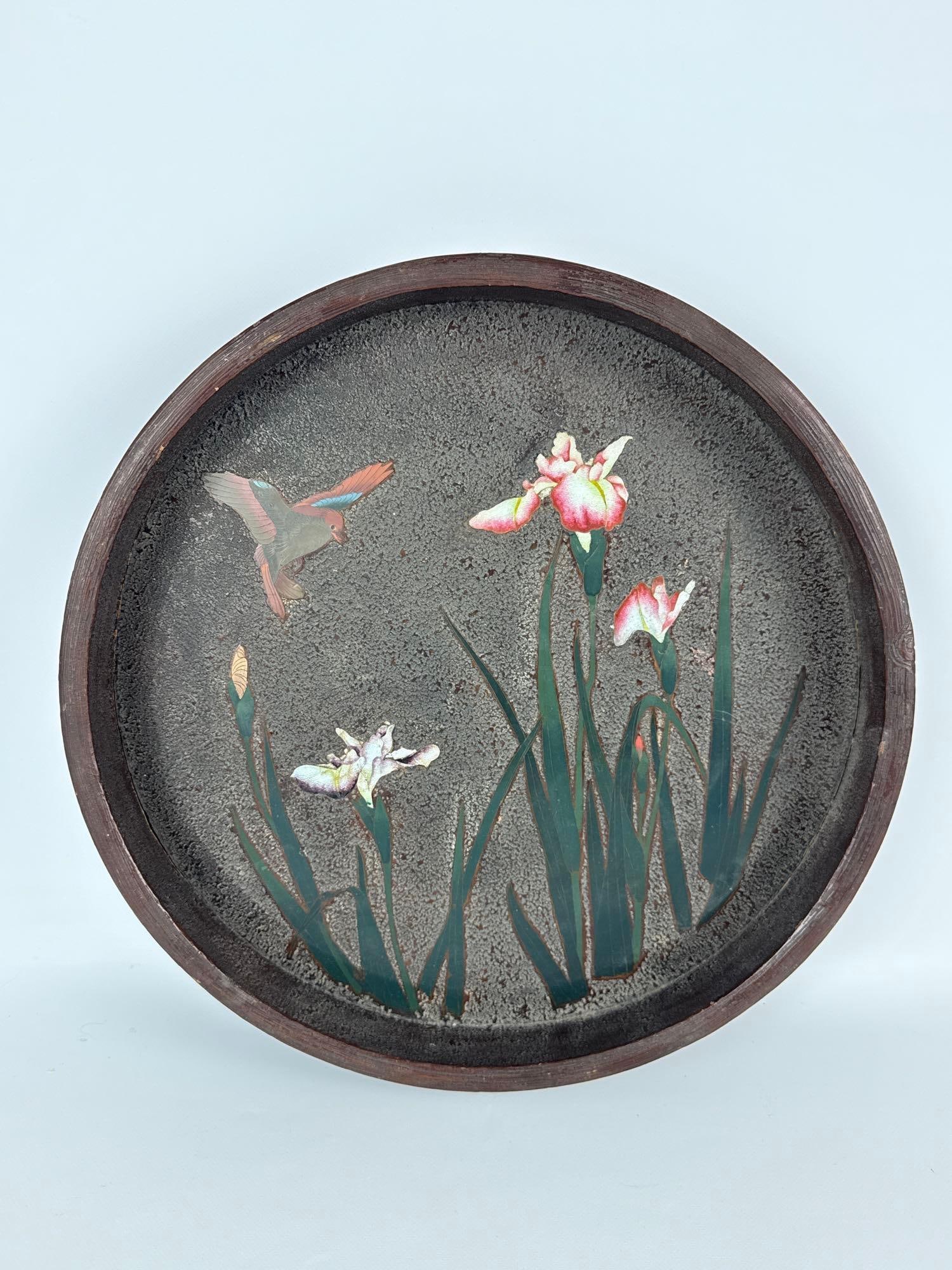 ANTIQUE JAPANESE MEIJI PERIOD CLOISONNÉ ENAMEL ROUND TRAY: Late 19th-to-early 20th-century circular bronze dish decorated with a textured stone-ground field depicting a flying bird and blooming irises. Approximate Dimensions: 2"h x 14.25"dia Artist or