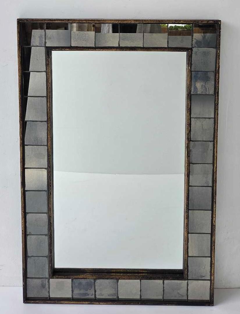 HOLLYWOOD REGENCY STYLE MIRRORED TILE RECTANGULAR WALL MIRROR: Mid-to-late 20th-century modern design accent mirror with a mosaic border of antiqued glass panels and gilded trim. Approximate Dimensions: 36" x 24" Artist or Maker: Unknown Provenance: A New