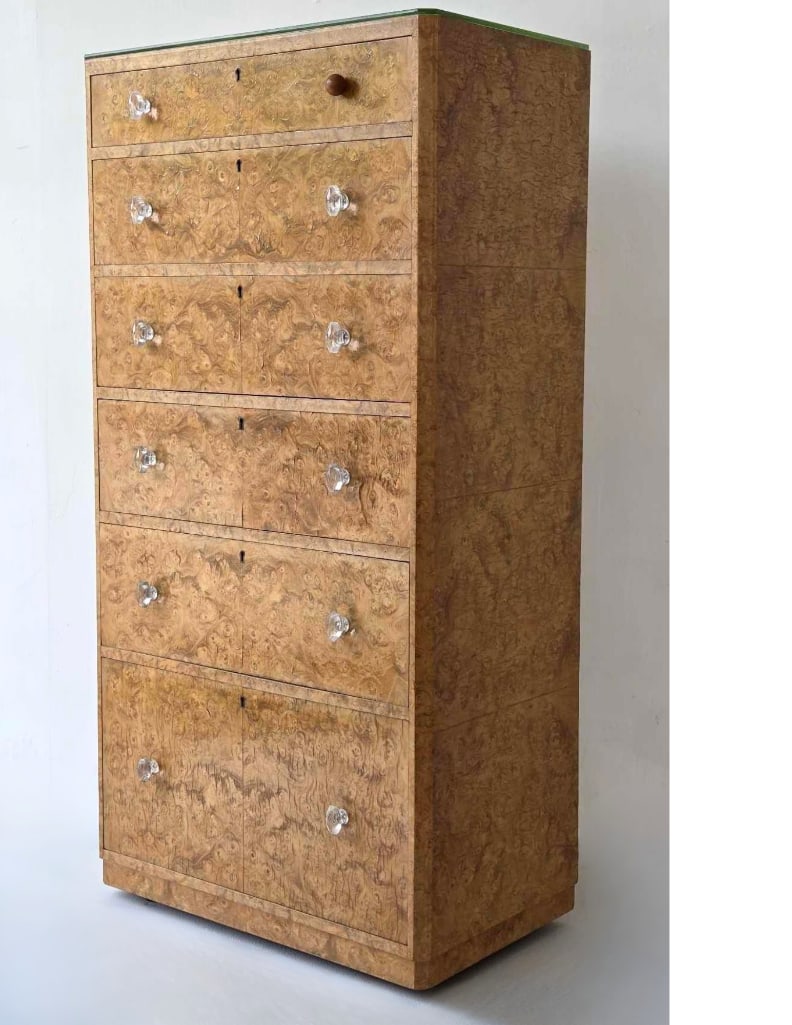 VINTAGE CONTEMPORARY BURL WOOD VENEER SIX DRAWER HIGH CHEST: Modern tallboy storage chest featuring finely figured burl veneer drawer fronts, minimalist metal pull hardware, and a mobile base resting on functional roller casters. Note one Drawer Pull is not lik