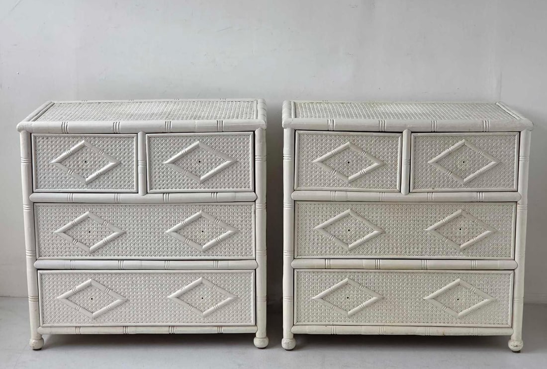 PAIR OF VINTAGE WHITE PAINT DECORATED FAUX BAMBOO FOUR DRAWER CHESTS WITH CANED INSETS: Pair of Hollywood Regency style white paint decorated faux bamboo four drawer chest of drawers with diamond motif caned insets Approximate Dimensions: 29.75