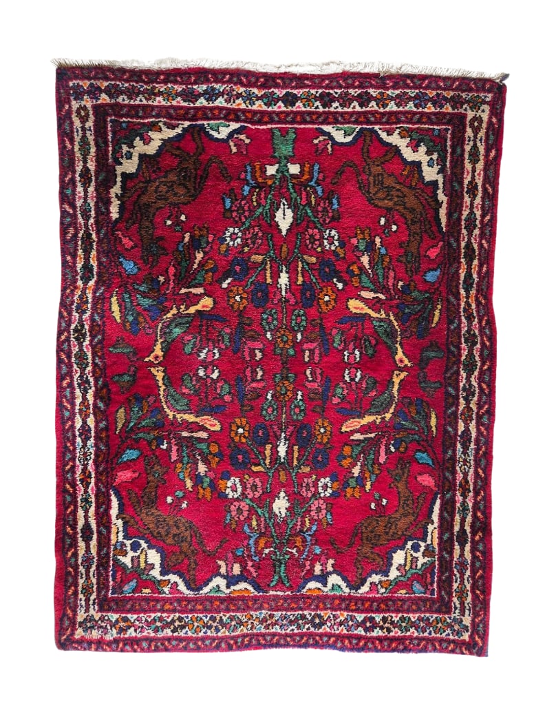 VINTAGE HAND-KNOTTED PERSIAN WOOL PICTORIAL THROW RUG: Traditional hand-woven wool accent mat decorated with a central tree of life motif flanked by stylized deer and birds on a vibrant pinkish-red ground Approximate Dimensions: 3' 6" x 2' 7&#