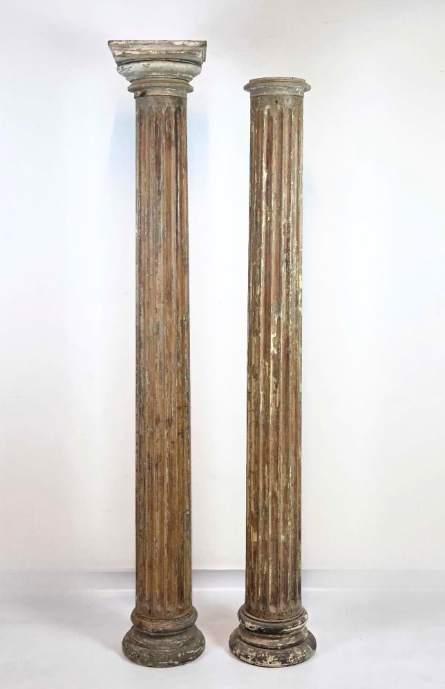 PAIR OF NEOCLASSICAL POLYCHROME FLUTED WOOD COLUMNS: A pair of tall, hand-carved fluted wood architectural columns with distressed polychrome painted finish, round bases, and a single detached ionic capital. Approximate Dimensions: 73"H x 11.25"